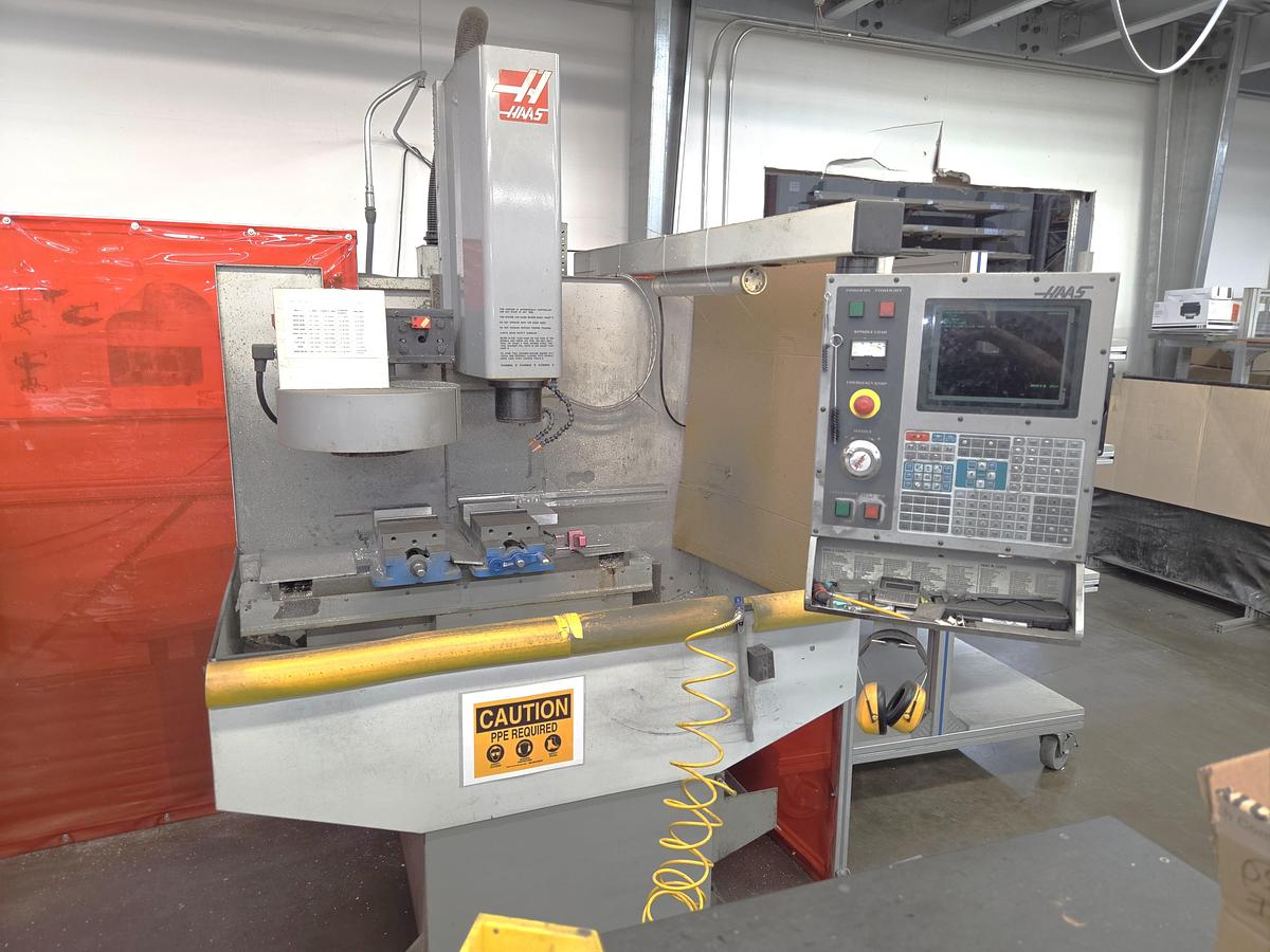 Used 2001 Haas Mini Mill with 10 Station ATC, 6000 RPM, Tool Changer, Open Table Design, Wire Either Three Phase or Single Phase, BT40 Taper