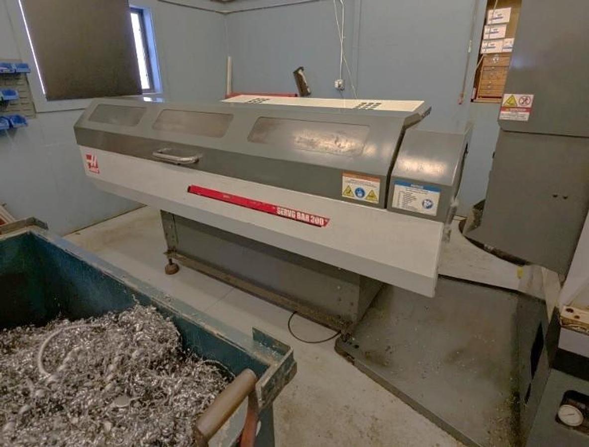 Used 2011 Haas ST-30M Chucker with Haas Barfeed, Chip Conveyor, Parts Catcher, Live Tooling, 3" Bar Cap., 10" Chuck, (5) Live Holders