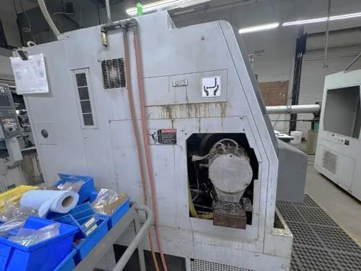 Used 2004 Mori Seiki SL-204MC with C Axis Rotation, Mill/Drilling Capability, Tailstock, Collet Chuck, Chip Conveyor, 2" Bar Capacity