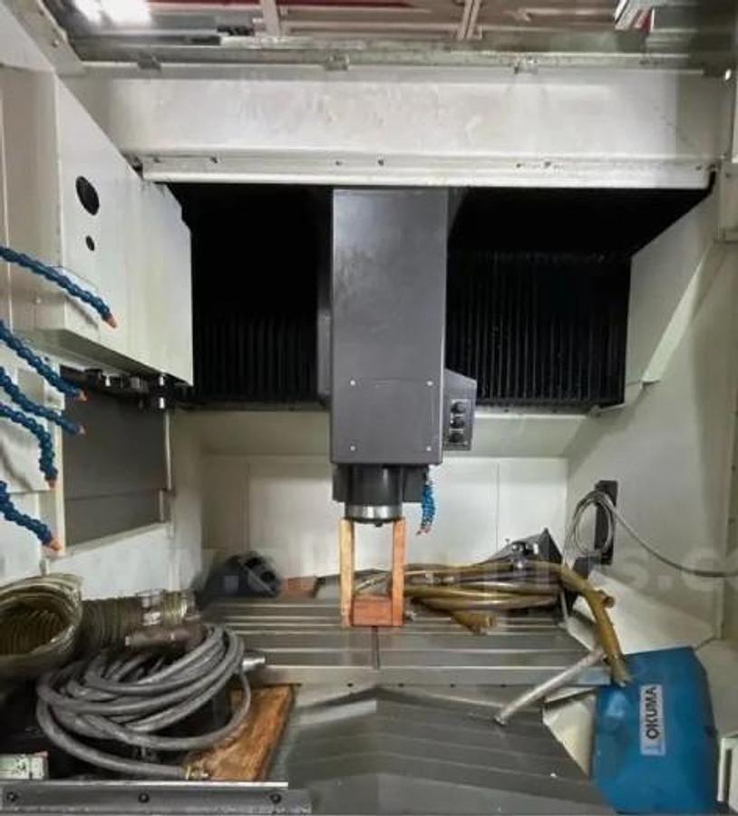 Used 2019 Okuma Genos M560-V with Chip Conveyor, High Pressure Coolant, Tool Probe