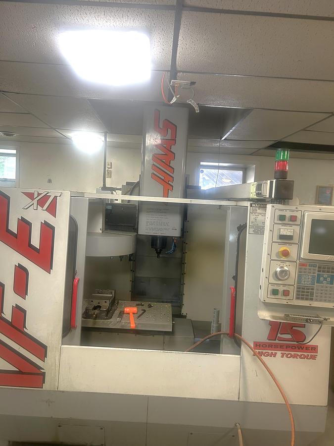 Used 1998 Haas VF-EXT with Flood Coolant, Belt Driven, CAT 40, 7500 RPM 30" X Axis Travel, 20 Station ATC, Well Cared For