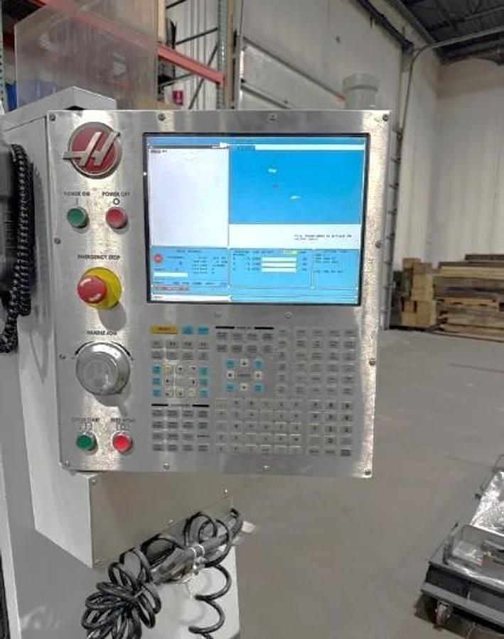 Used 2010 Haas VF2SS with 24 Station SMATC, 12,000 RPM, Remote Jog Handle, USB Port Interface, High Intensity Lighting