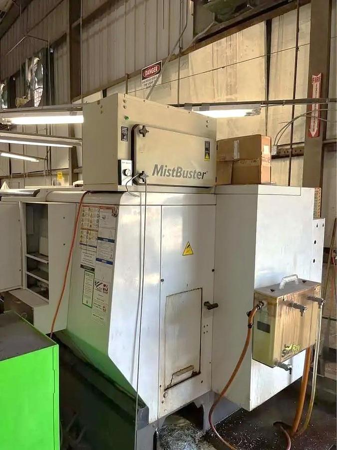 Used 2011 Haas ST-20 with Tailstock, Haas Servo 300 Barfeeder, Chip Conveyor, Tool Presetter, Collet Chuck, Mist Buster