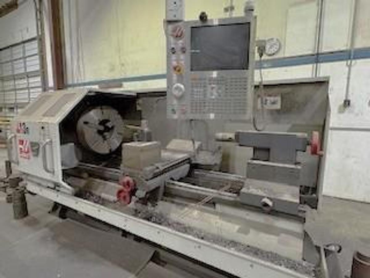 Used 2014 Haas TL-3B Big Bore with 8.5" Bar Capacity, (2) 24" Manual Chucks, Aloris Tool Post, Hand Wheels