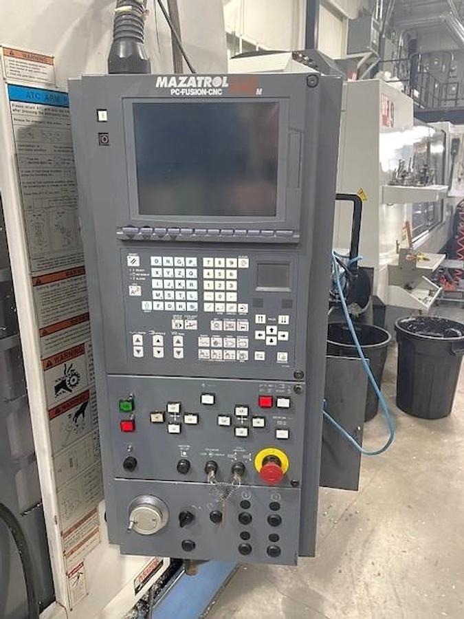 Used 2000 Mazak VTC200B with Chip Conveyor, 30 Station Side Mounted Tool Changer, Very Nice Condition, Located in Ontario, Canada