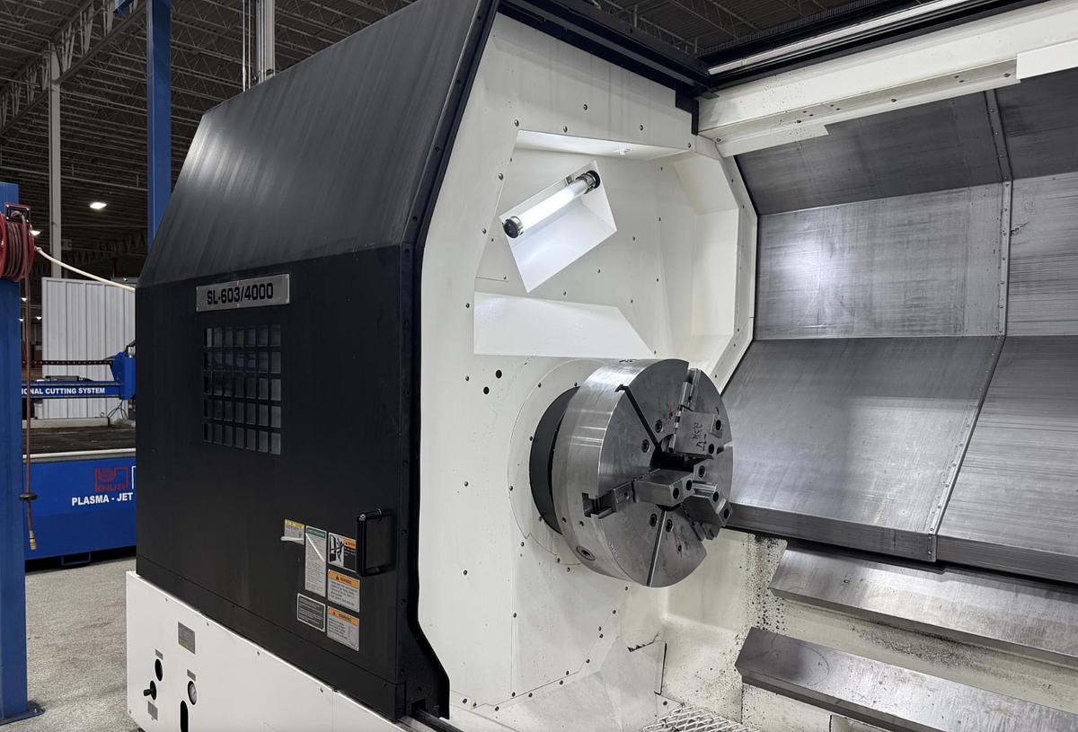 Used 2022 DMG Mori SL603BMC/4000 with C Axis/Live Milling, 28" 3 Jaw Chk, 21" Rear Chk, Steady Rests, 7.3" Bar Cap., Fanuc