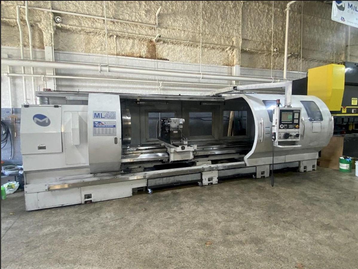 Used 2010 Milltronics ML40/160 with 14" Big Bore Spindle, 31.5" 3 Jaw Manual Chuck, Tailstock, 12 Station Turret, (2) Steady Rests