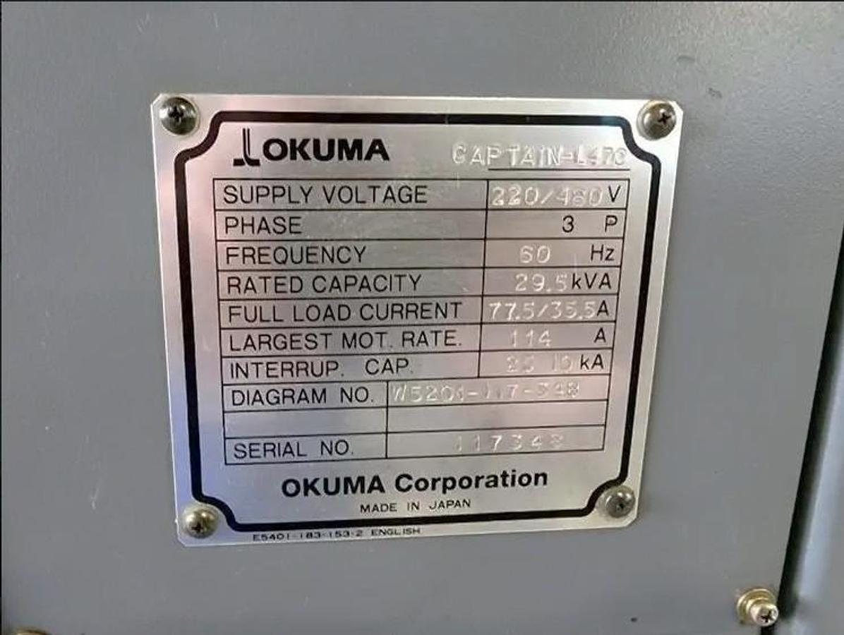 Used 2005 Okuma Captain L470M with C Axis, Milling Capability, 12" Hyd. Chuck, Tailstock, Tool Presetter, Chip Conveyor
