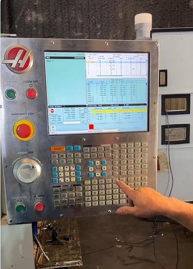 Used 2014 Haas VF4 with Haas HRT210 4th Axis Rotary Table, 24 Station SMATC, PCool, Chip Auger