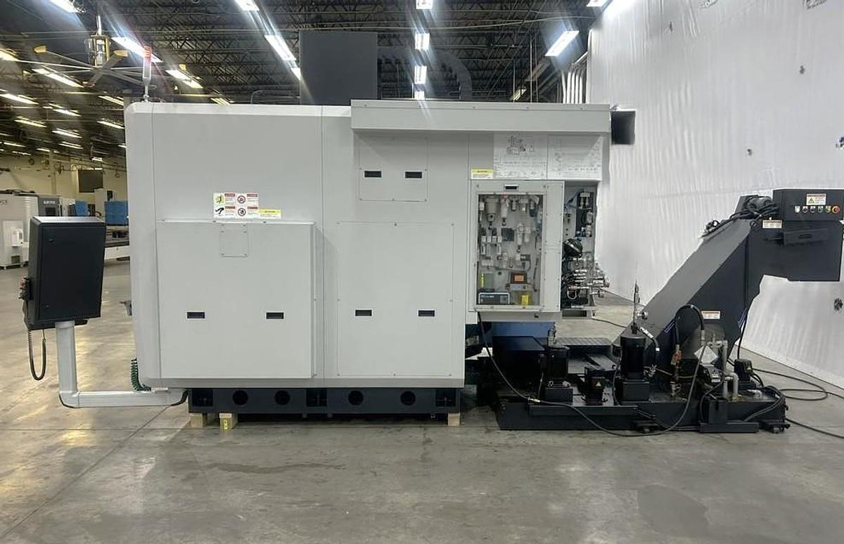 Used 2022 DN Solutions DVF 6500 5 Axis Trunnion VMC with 18,000 RPM, 60 ATC, Coolant Thru Spindle, Probing, Chip Conveyor