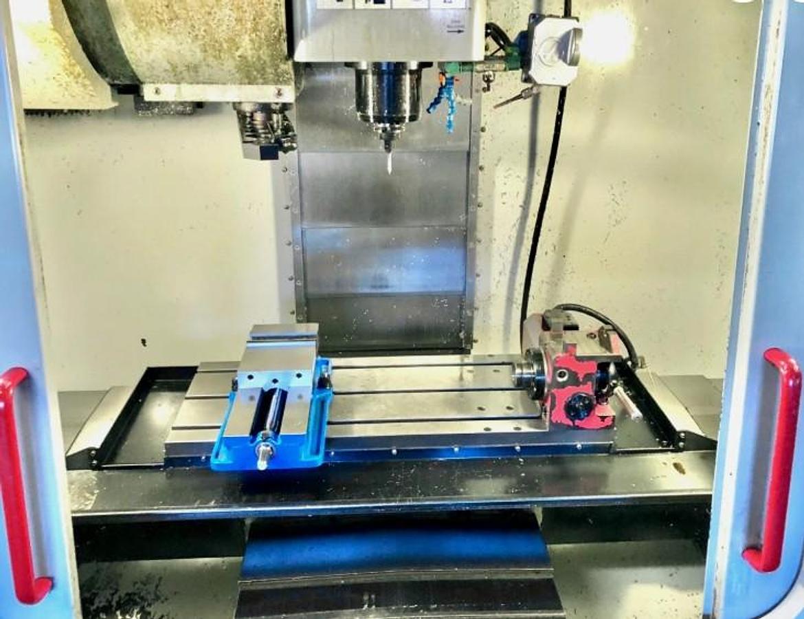 Used 2004 Haas VF2D with 4th Axis Drive, 24 Station Side Mount ATC, Chip uger, Programmable Coolant