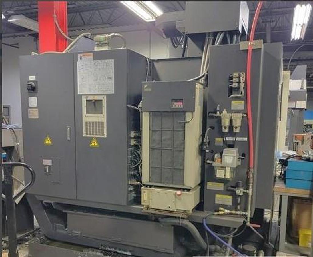 Used 2015 Okuma M560-V with 4th Axis Rotary Table, Renishaw Tool & Part Probing, 15k RPM, 32 Pos. ATC, Chip Claster HPC