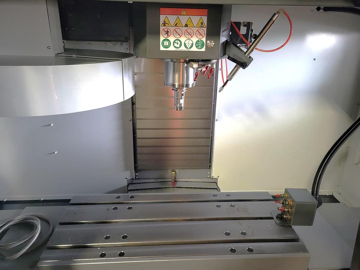 Used 2023 Haas VF2 with 10,000 RPM, High Spd Machining, Chip Auger, Haas Chip Lift, Auto Air Gun, Programmable Air, Very Low Hours