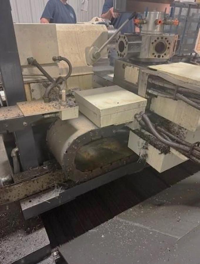 Used 2007 Mazak Powermaster 3000U  w/ 10.2" Bore, (2) 18" 4 Jaw Manual Chucks, Chip Conveyor, Tailstock