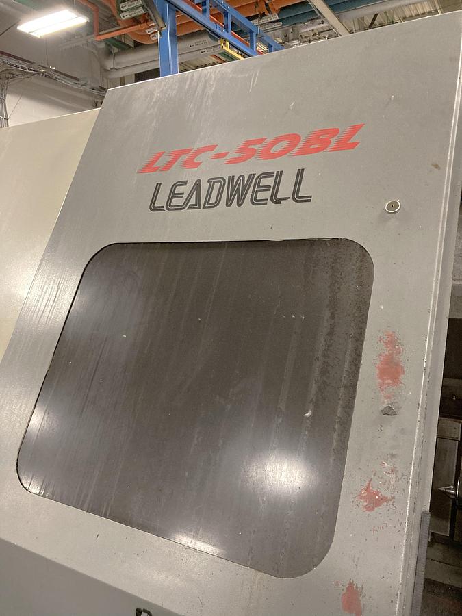Used 2006 Leadwell LTC50-BL with 18" Hyd Chk, 4.6" Bar Cap., 33.5" sw, 80" cc, 1500 RPM, 50 HP, Steady Rest, Conveyor, Fanuc 0i-TC