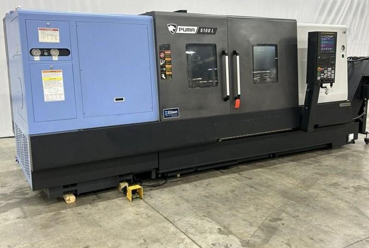 Used 2022 DN Solutions Puma 5100LC with 24.75" 4 Jaw Hyd. Chuck, 10.5" Spindle Bore, 82" Turn Length, Chip Conveyor, Tailstock