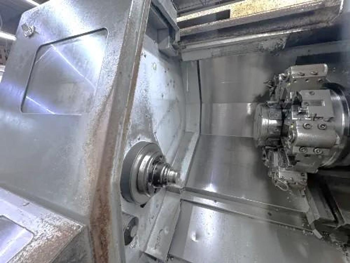 Used 2004 Mori Seiki SL-204MC with C Axis Rotation, Mill/Drilling Capability, Tailstock, Collet Chuck, Chip Conveyor, 2" Bar Capacity