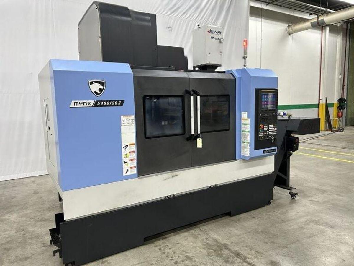 Used 2022 DN Solutions Mynx 5400/50 II with 4th Axis Drive, CAT50 Big Plus Spindle, Chip Conveyor, Mist Collector, Conversational