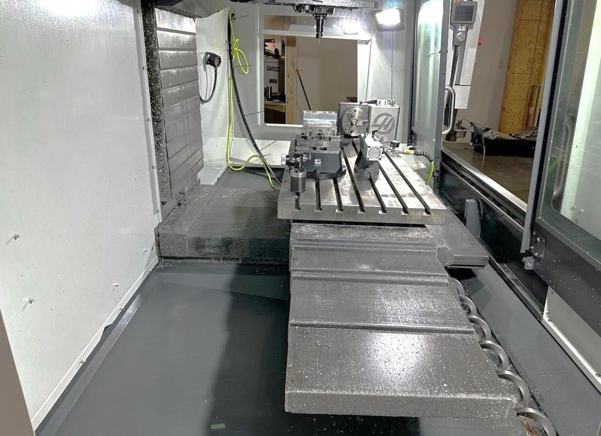 Used 2021 Haas VF-5SS with Haas HRT-160 4th Axis Table, Probing, PCool, Auger, 4th & 5th Axis Drives, Mist Collector, Tooling
