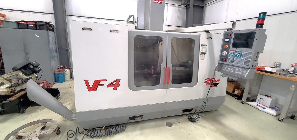 Used 2001 Haas VF4D with Haas HRT210 4th Axis Table, Tailstock, Auger, Prog. Coolant, Quick Code