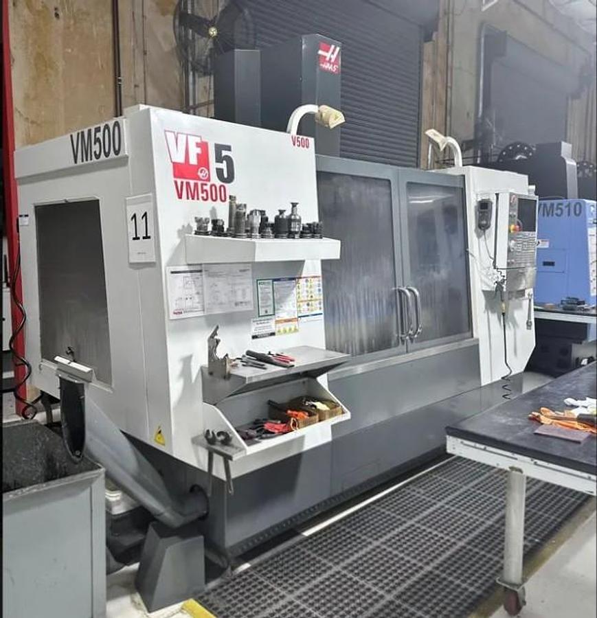Used 2011 Haas VF5/40 w/ Haas HRT310 Rotary Table, 10,000 RPM, PCool, HSM, Auger