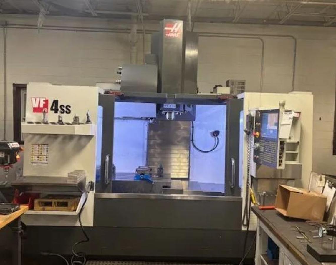 Used 2015 Haas VF-4SS w/Wired for 4th axis, Remote Jog Handle, WIPS Renishaw Tool & Part Probe, Programmable Coolant Nozzle, 1k Coolant Thru the Spindle
