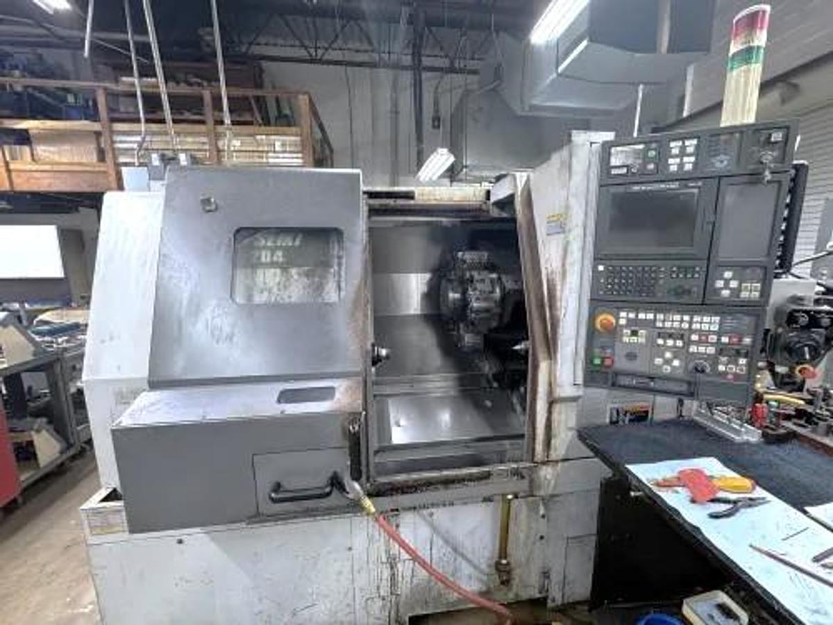 Used 2004 Mori Seiki SL-204MC with C Axis Rotation, Mill/Drilling Capability, Tailstock, Collet Chuck, Chip Conveyor, 2" Bar Capacity