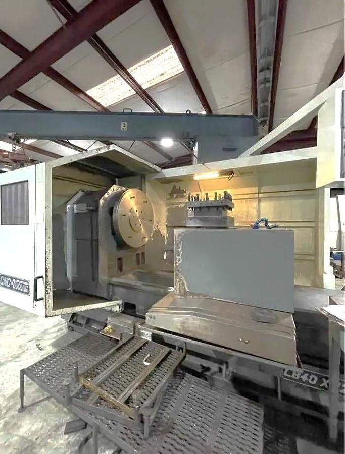 Used 2013 Takang LB40 x 1200 CNC Heavy Duty Lathe with 60" sw, 39.3" Max Cut Diam., 600 RPM, 6" Bore, 36" Chuck, 4 Pos. Trt., Fanuc