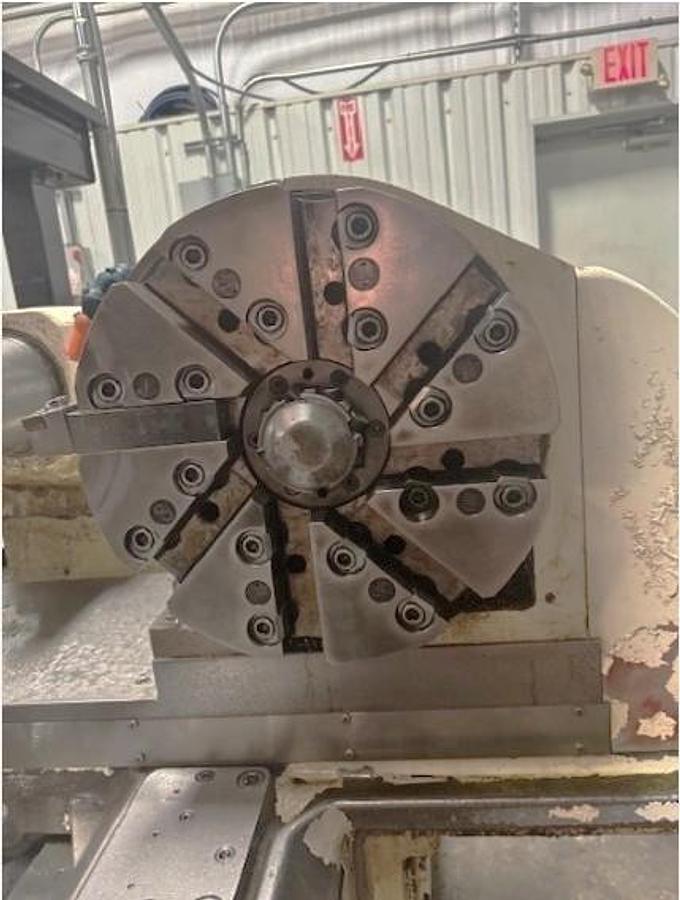 Used 2007 Mazak Powermaster 3000U  w/ 10.2" Bore, (2) 18" 4 Jaw Manual Chucks, Chip Conveyor, Tailstock