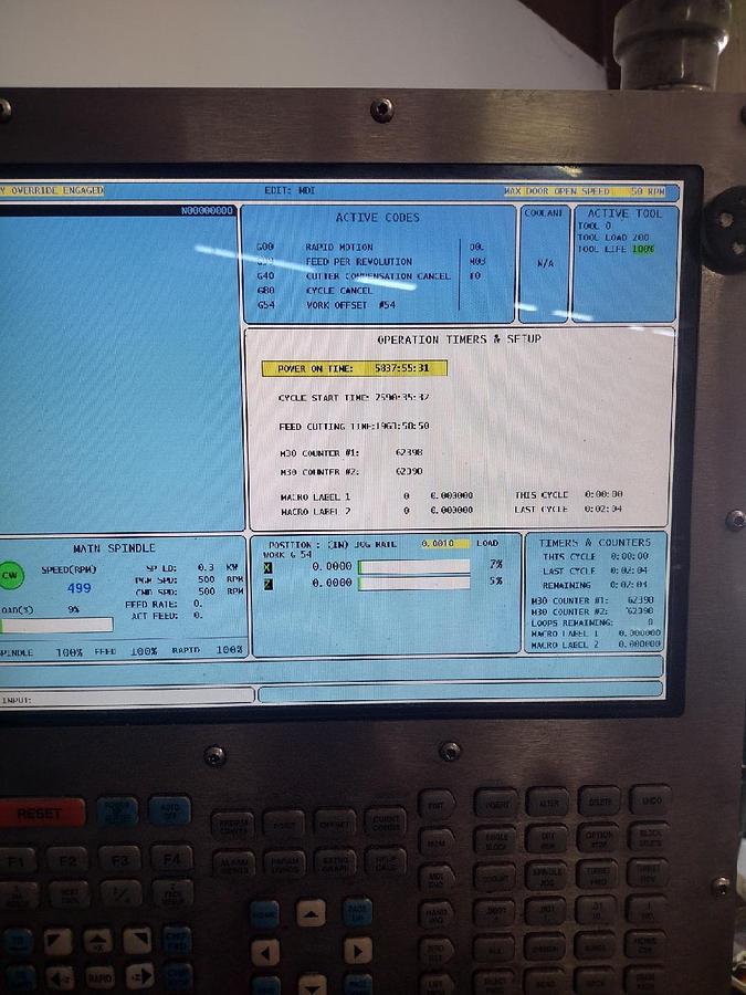 Used 2012 Haas TL-2 with 3" Big Bore Option, Tailstock, 10" 3 Jaw Chuck, Tool Post, Chuck Guard, Manual Hand Wheels