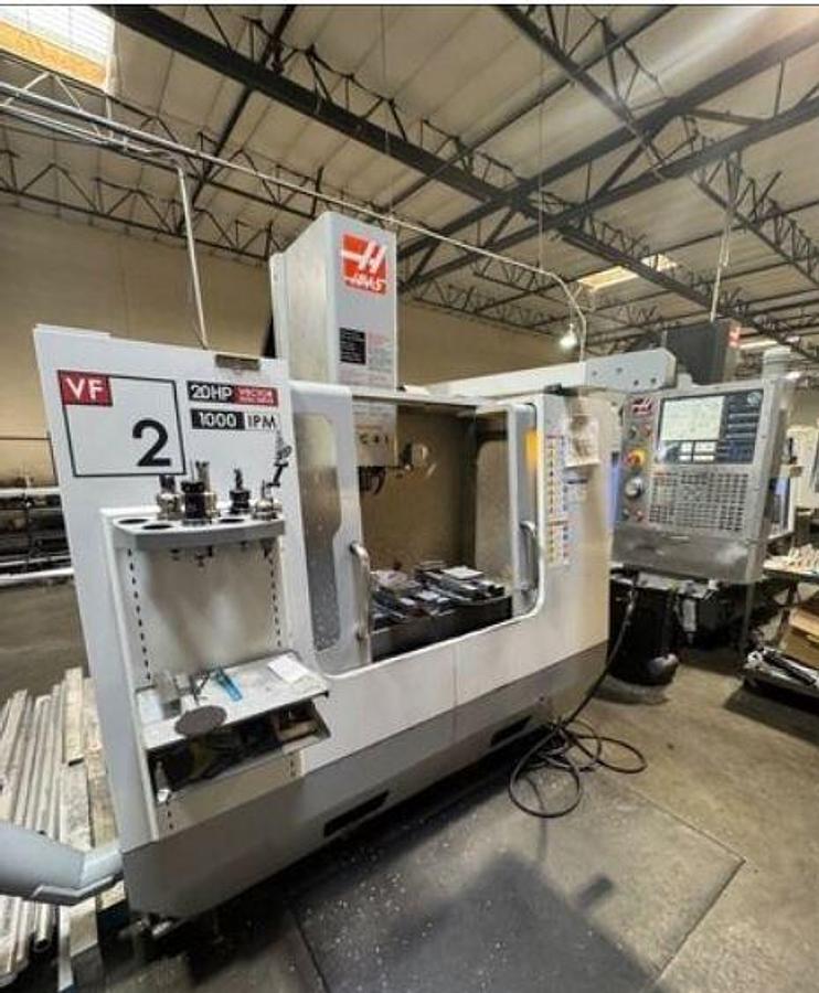 Used 2007 Haas VF-2D with 10,000 RPM, Chip Auger, Progr. Coolant