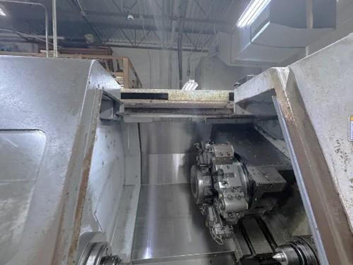 Used 2004 Mori Seiki SL-204MC with C Axis Rotation, Mill/Drilling Capability, Tailstock, Collet Chuck, Chip Conveyor, 2" Bar Capacity