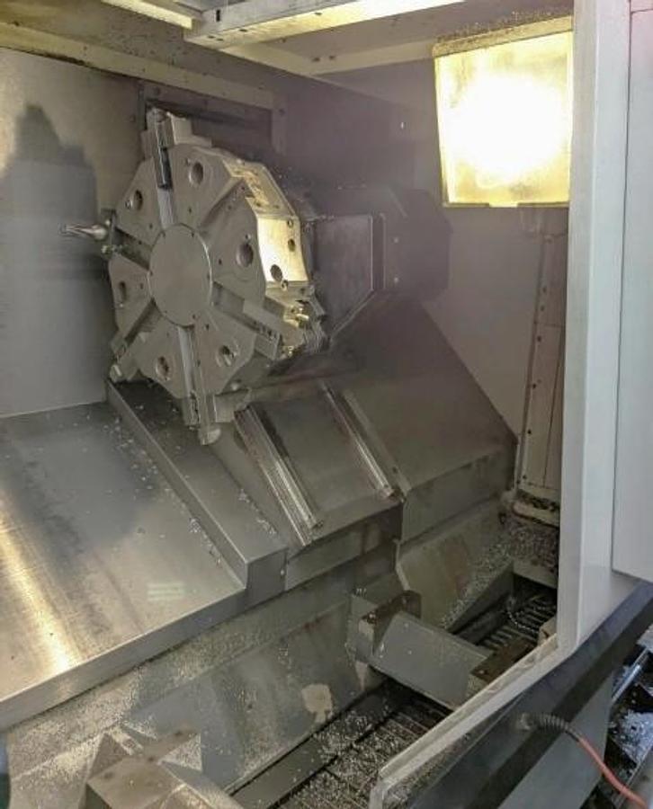 Used 2011 Haas ST-30M Chucker with Haas Barfeed, Chip Conveyor, Parts Catcher, Live Tooling, 3" Bar Cap., 10" Chuck, (5) Live Holders