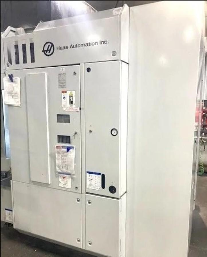 Used 2018 Haas UMC-750 5 Axis Universal Machining Center, 40 ATC, Probing, 1000 PSI CTS, Conveyor