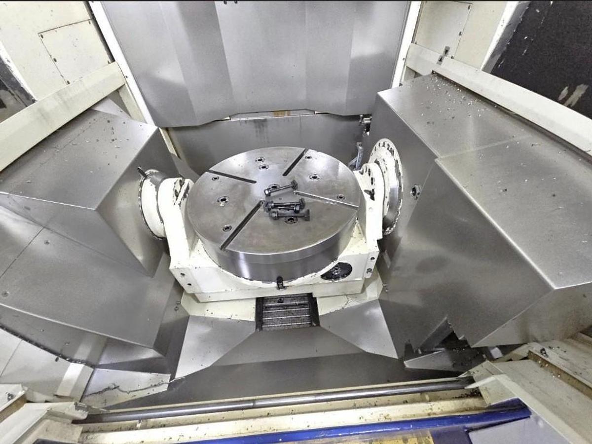 Used 2017 Kitamura MyTrunnion-5 Five Axis Trunnion Style VMC with 20,000 RPM, 50 Station ATC, 24" Diam Chuck, Coolant Thru Spindle, Conveyor