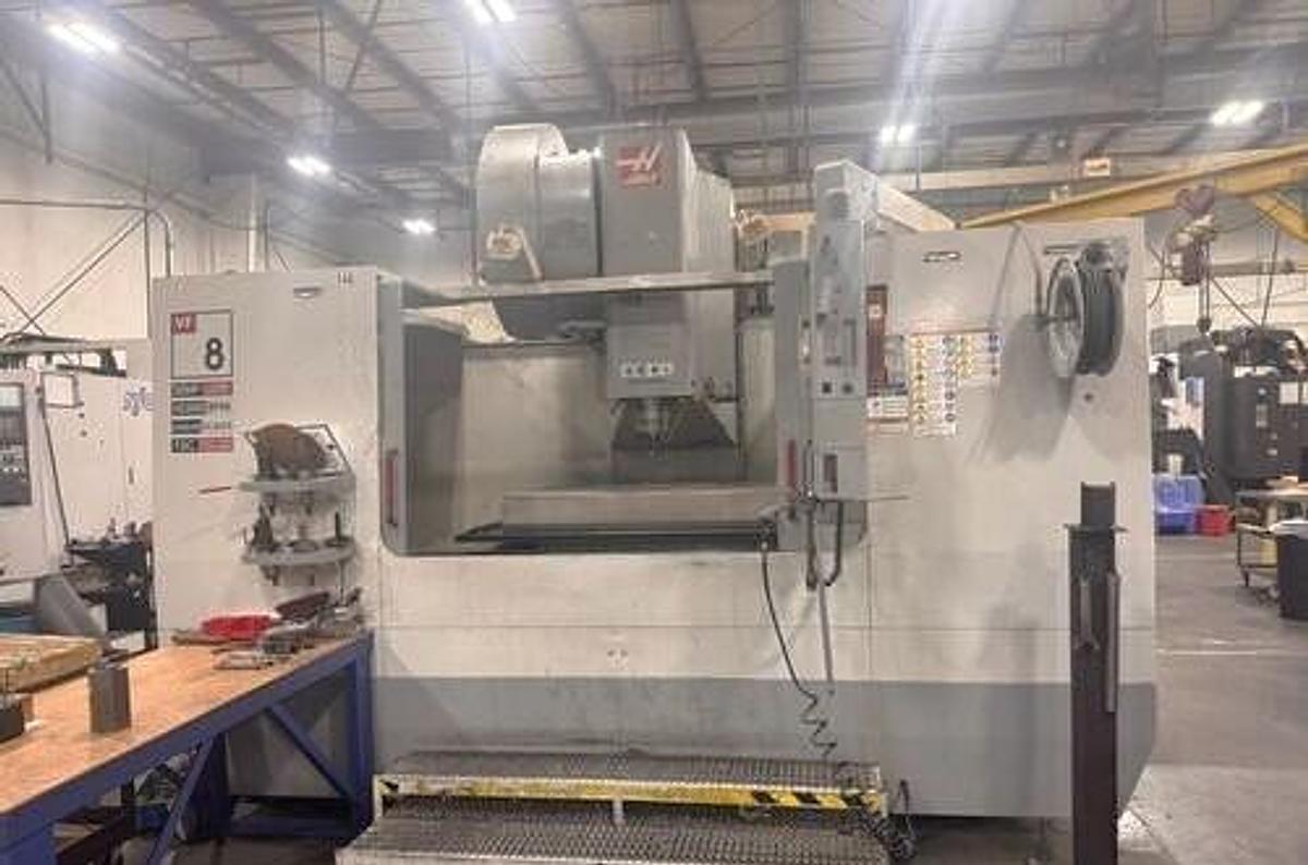 Used 2004 Haas VF8/50 with 50 Taper Spindle, 10,000 RPM Geared Head, Coolant Thru Spindle, Probe Ready, PCool, Auger, Side Mounted ATC