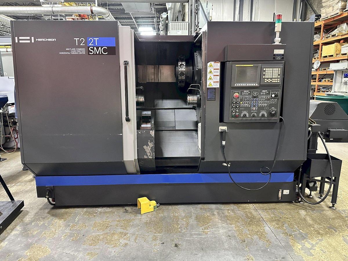 Used 2013 Hwacheon T2-2T with Twin Spindle, Twing Turrets, Live Milling/Drilling, Parts Catcher & Conveyor, Chip Conveyor, Fanuc 0i-TD