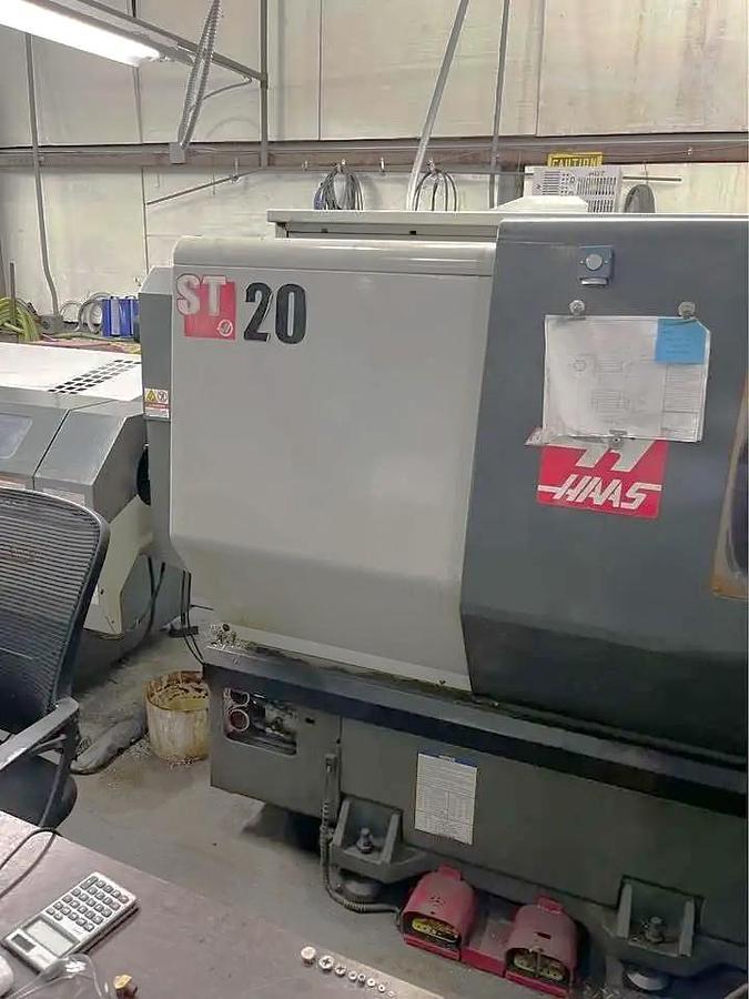 Used 2011 Haas ST-20 with Tailstock, Haas Servo 300 Barfeeder, Chip Conveyor, Tool Presetter, Collet Chuck, Mist Buster