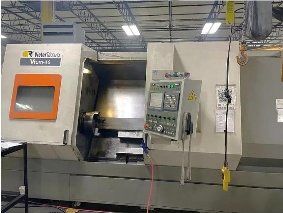 Used 2012 Victor Taichung VTurn 46 Heavy Duty CNC Lathe with 32" sw, 69" cc, 4.52" Bar Capacity, 68 HP, 15" Chuck, 4 Spd Gearbox