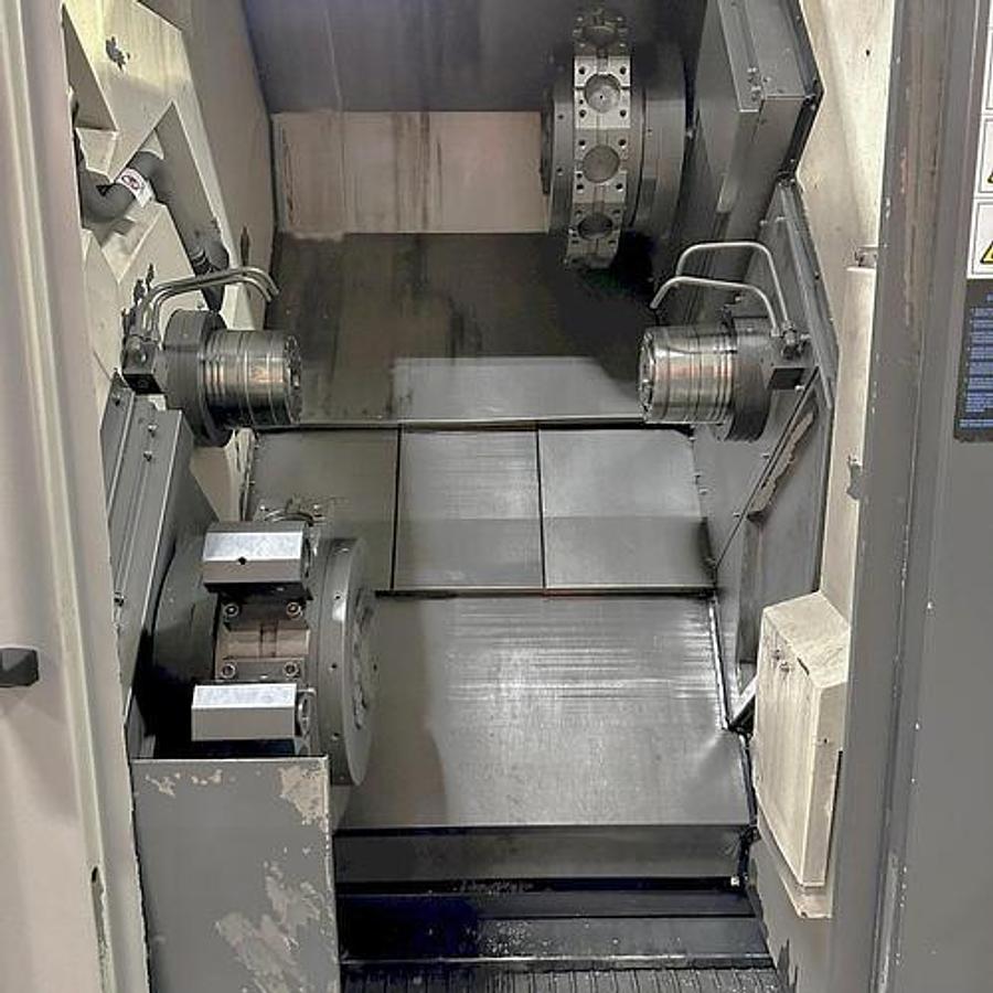 Used 2013 Hwacheon T2-2T with Twin Spindle, Twing Turrets, Live Milling/Drilling, Parts Catcher & Conveyor, Chip Conveyor, Fanuc 0i-TD