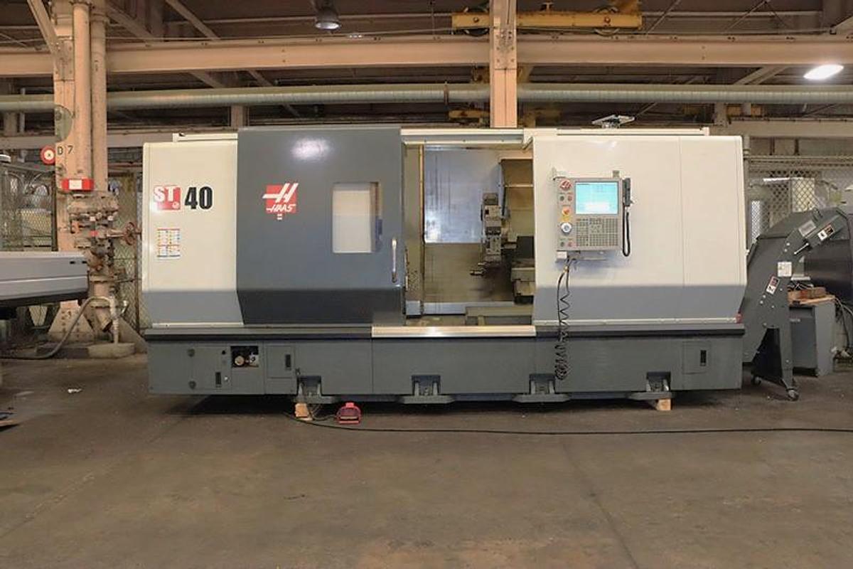 Used 2012 Haas ST-40 Chucker with 15" Hydr. Chuck, Tool Presetter, Chip Conveyor, 4" Bar Capacity, Some Tool Holders (no tailstock)