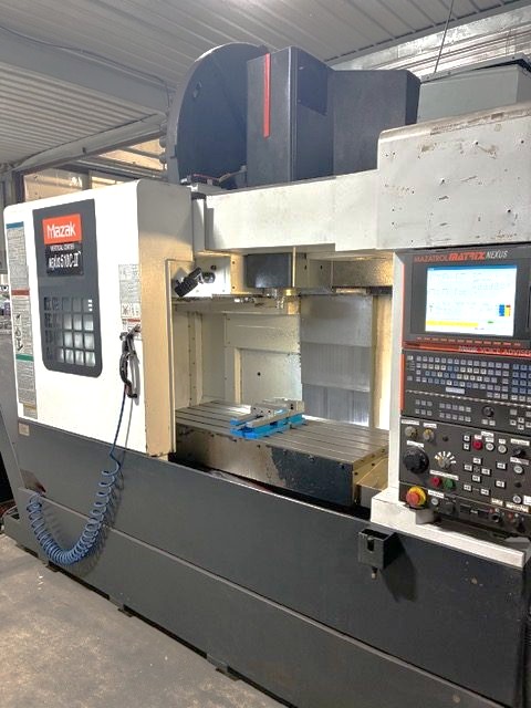 Used 2009 Mazak Nexus VCN 510C/40 II with Chip Conveyor, 48 Station Side Mounted ATC, CAT 40, 12,000 RPM, ONLY 2,201 CUT HOURS!!