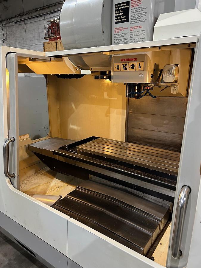 Used 2008 Haas VF-3B with Haas Probing, Chip Auger, 24 Station Side Mounted ATC, Remote Jog Handle, Programmable Coolant Nozzle