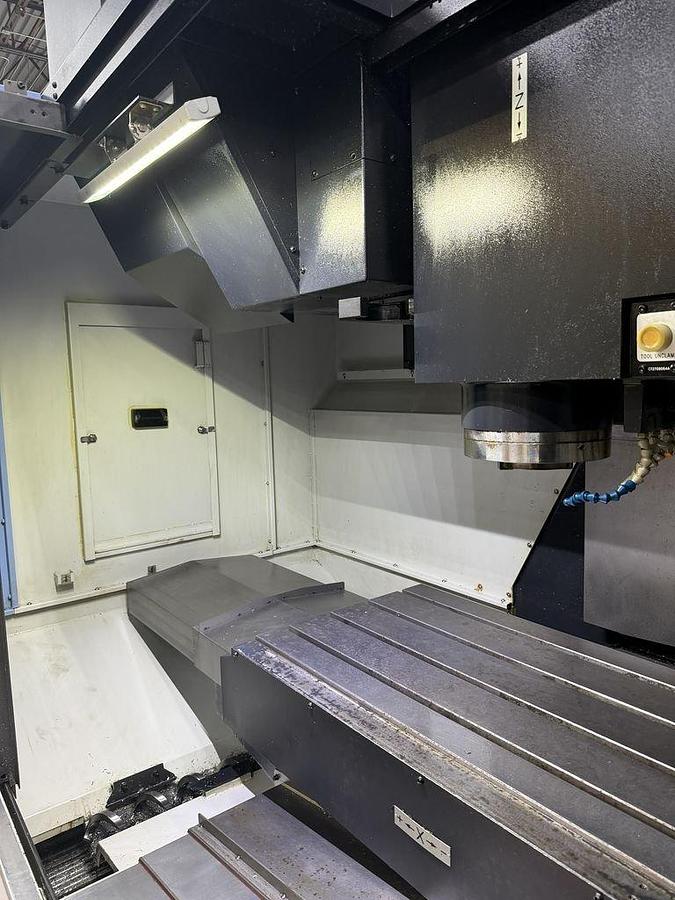 Used 2022 DN Solutions Mynx 5400/50 II with 4th Axis Drive, CAT50 Big Plus Spindle, Chip Conveyor, Mist Collector, Conversational