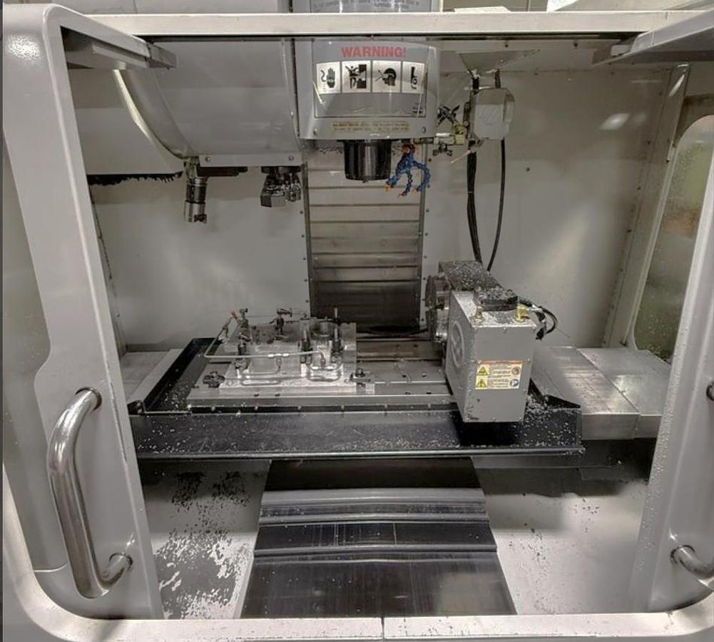 Used 2006 Haas VF2SS with 4th Axis Drive ONLY, Remote Jog Handle, Chip Auger, Programmable Coolant Nozzle