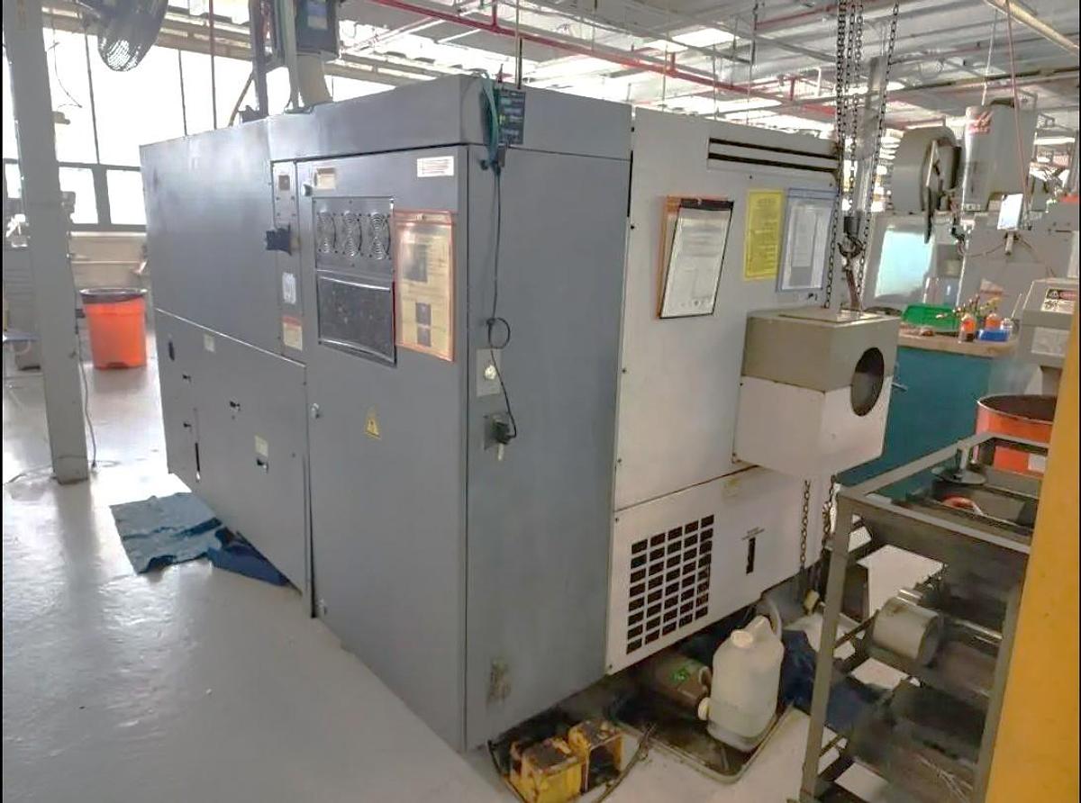 Used 2005 Okuma Captain L470M with C Axis, Milling Capability, 12" Hyd. Chuck, Tailstock, Tool Presetter, Chip Conveyor