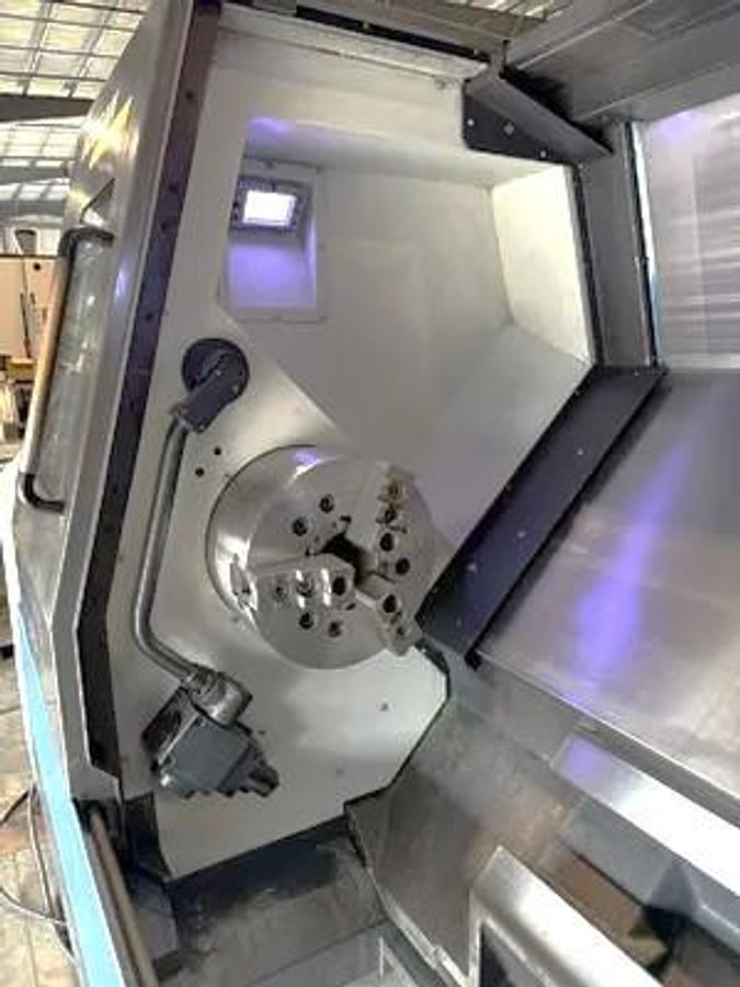 Used 2012 Doosan Puma 400MB with C Axis, Milling Capable, 15" Hyd. Chk, 4.5" Bar Cap., 41.3" cc, Tailstock, Conveyor, Live Tooling