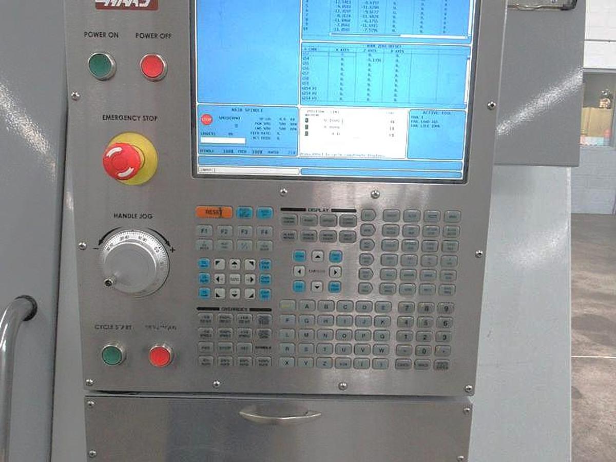 Used 2008 Haas SL-20T with Tailstock, 8" Hyd Chuck, Tool Presetter, Parts Catcher, Chip Auger, 2" Bar Cap., Cold Fire II Processor