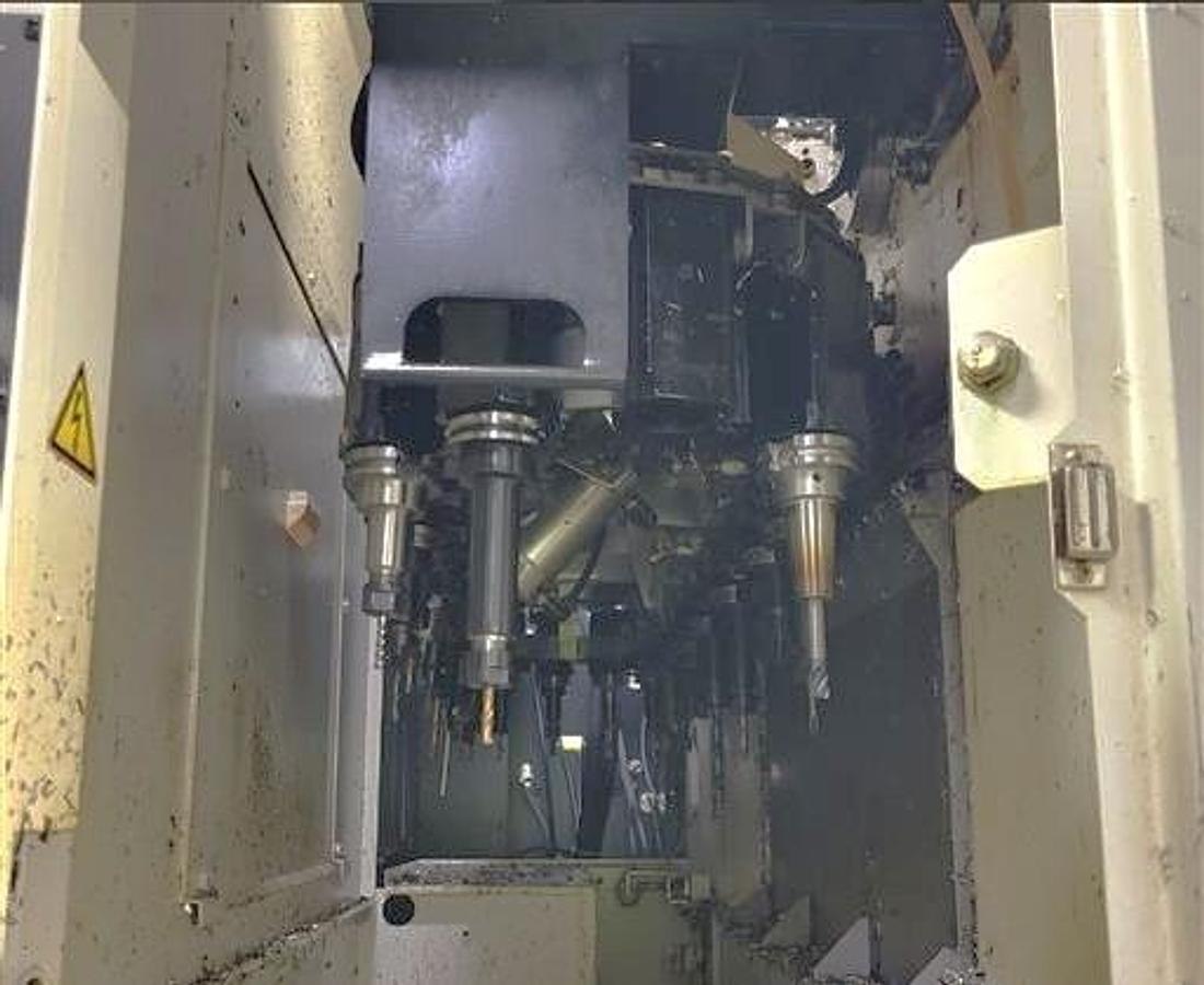 Used 2015 Okuma M560-V with 4th Axis Rotary Table, Renishaw Tool & Part Probing, 15k RPM, 32 Pos. ATC, Chip Claster HPC