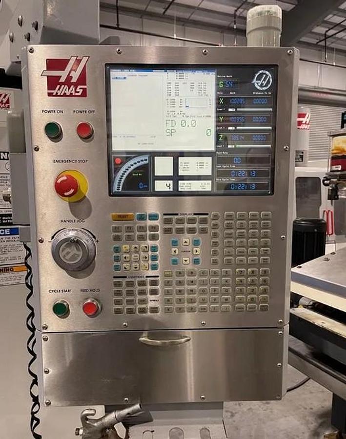Used 2006 Haas VM-2 with Haas HRT210 4th Axis Table, Prog. Coolant, Remote Jog Handle, 24 Station Side Mount ATC, High Spd Machining